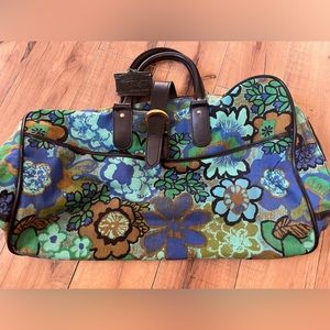 Vintage crescent floral suitcase. Very good used condition. Smoke free home